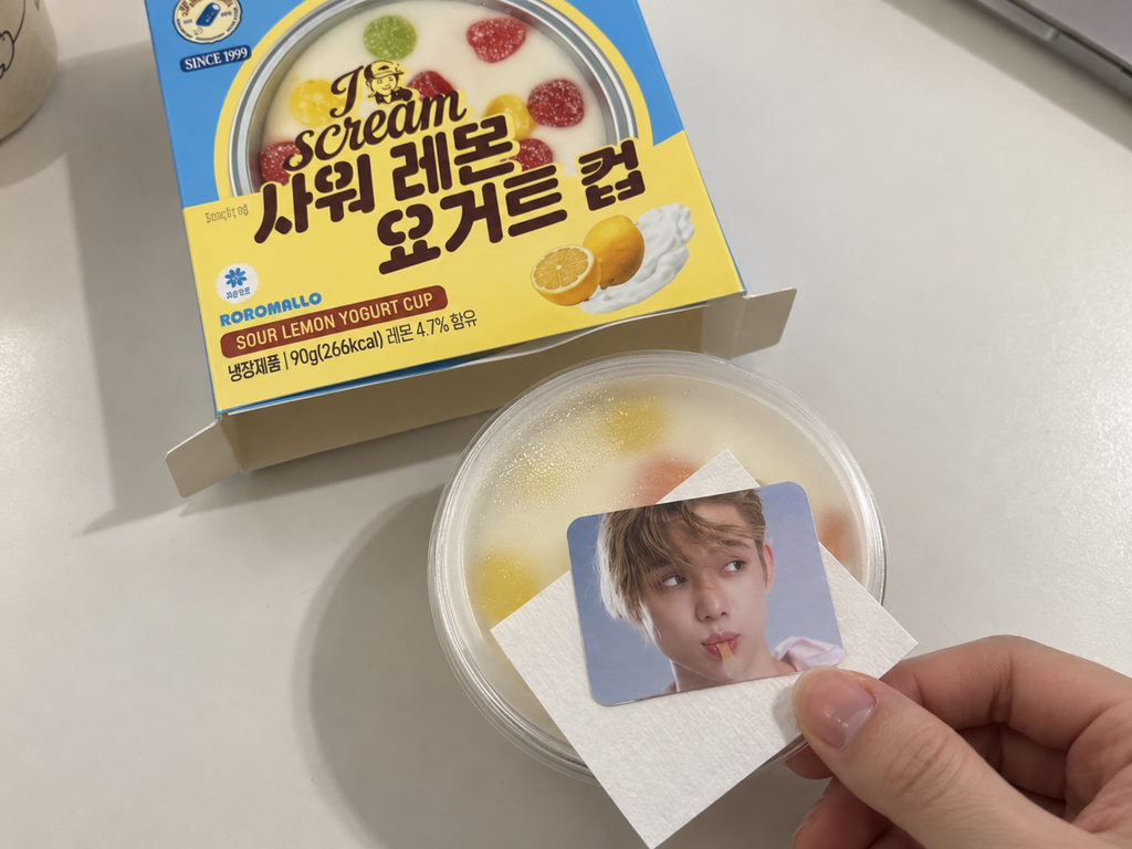 A Korean convenience-store collaboration snack beside the random collectible found inside